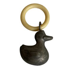 Vintage metal duck baby rattle toy collectible